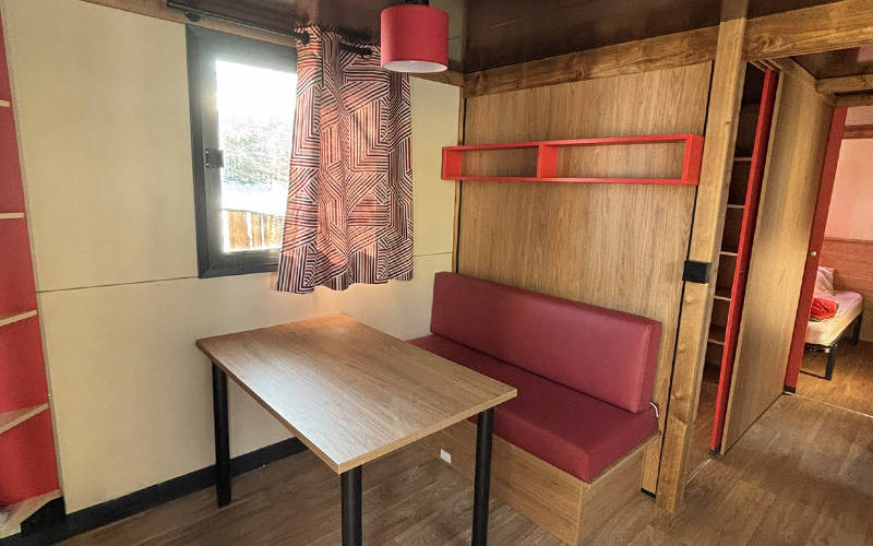 Dining area of the Roulotte, unique accommodation in Haute-Loire, for rent at Les Murmures du Lignon campsite